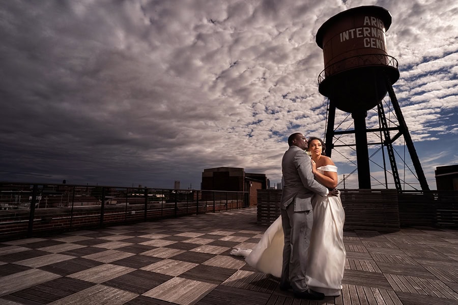 dramatic wedding picture of bride and groom on roof of Ariel International Cleveland